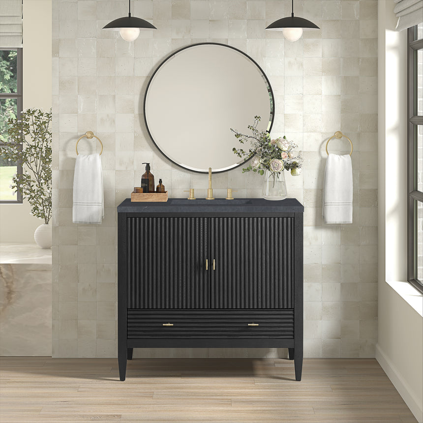 White bathroom vanity with marble countertop and decorative flowers in a bathroom setting.