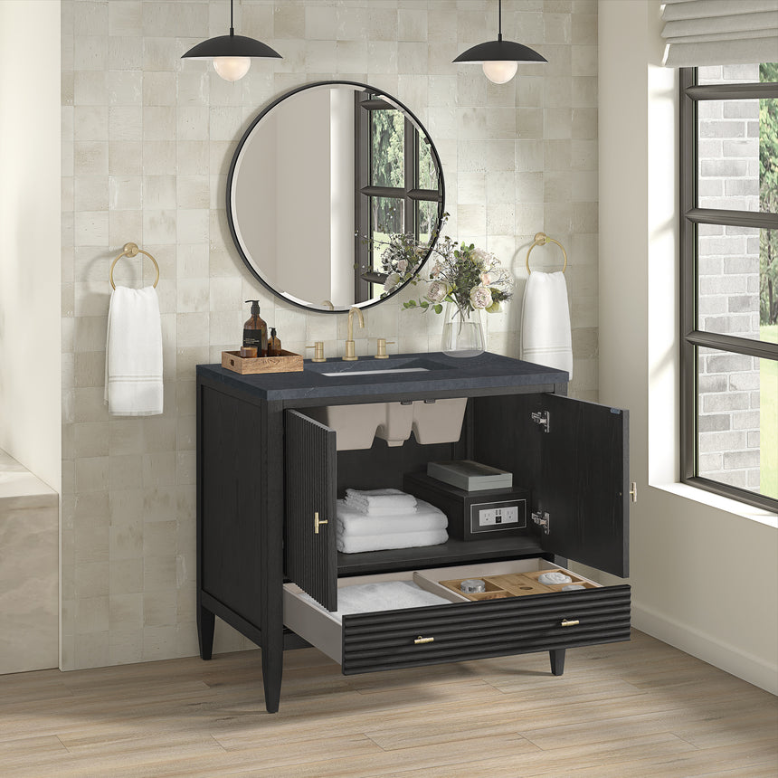 White bathroom vanity with marble countertop and decorative flowers in a bathroom setting.