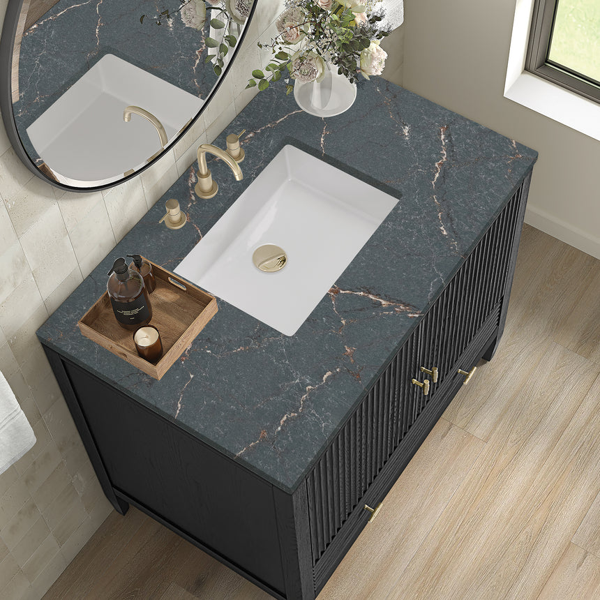 White bathroom vanity with marble countertop and decorative flowers in a bathroom setting.