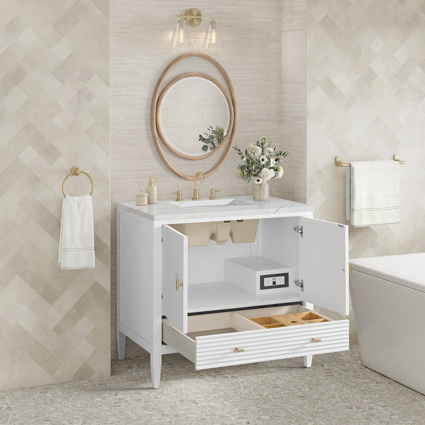White bathroom vanity with marble countertop and decorative flowers in a bathroom setting.