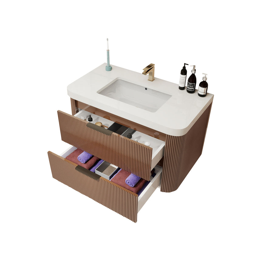 Modern bathroom with wooden vanity, freestanding bathtub, and shower area.