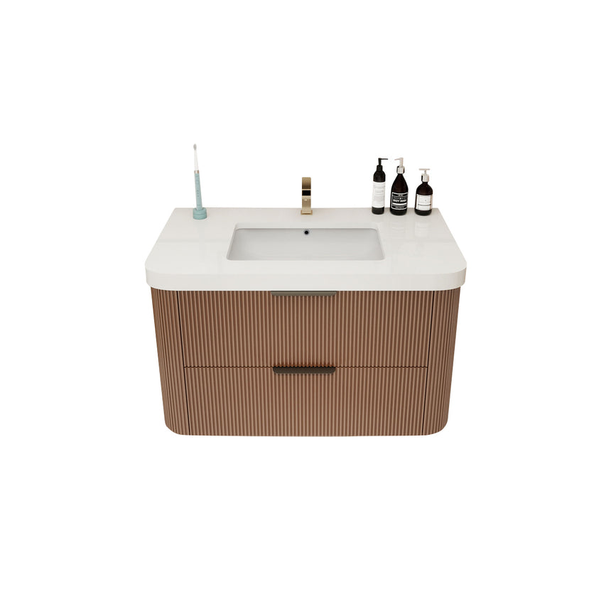 Modern bathroom with wooden vanity, freestanding bathtub, and shower area.