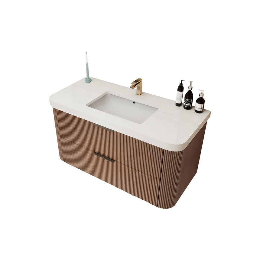 Modern bathroom with wooden vanity, freestanding bathtub, and shower area.