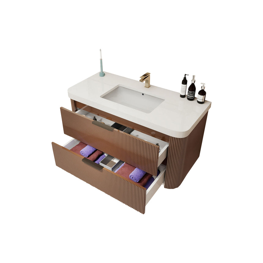 Modern bathroom with wooden vanity, freestanding bathtub, and shower area.
