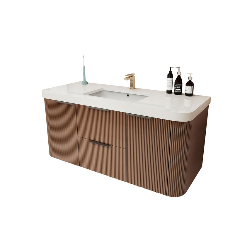 Modern bathroom with wooden vanity, freestanding bathtub, and shower area.
