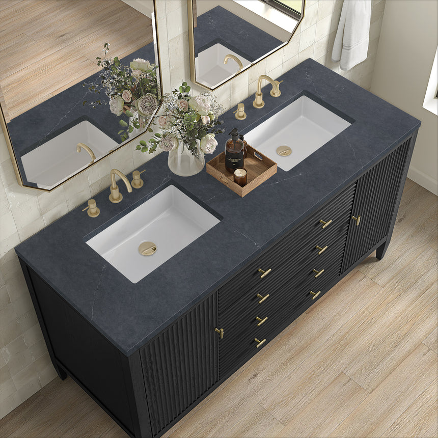 White bathroom vanity with marble countertop and decorative flowers in a bathroom setting.