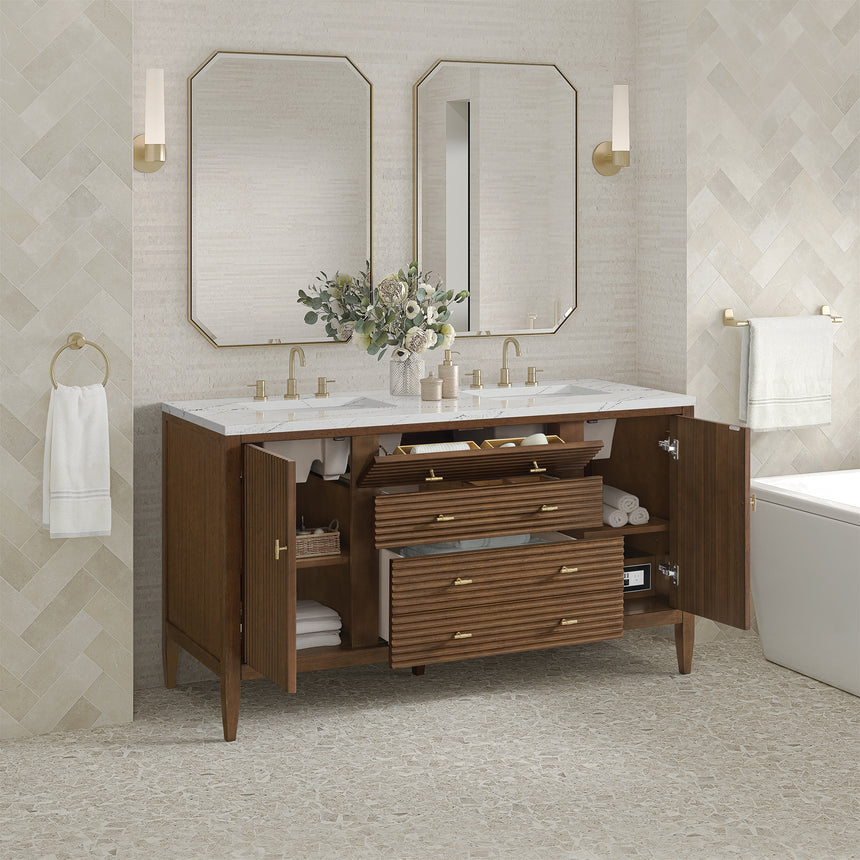 White bathroom vanity with marble countertop and decorative flowers in a bathroom setting.