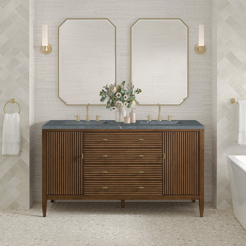 White bathroom vanity with marble countertop and decorative flowers in a bathroom setting.