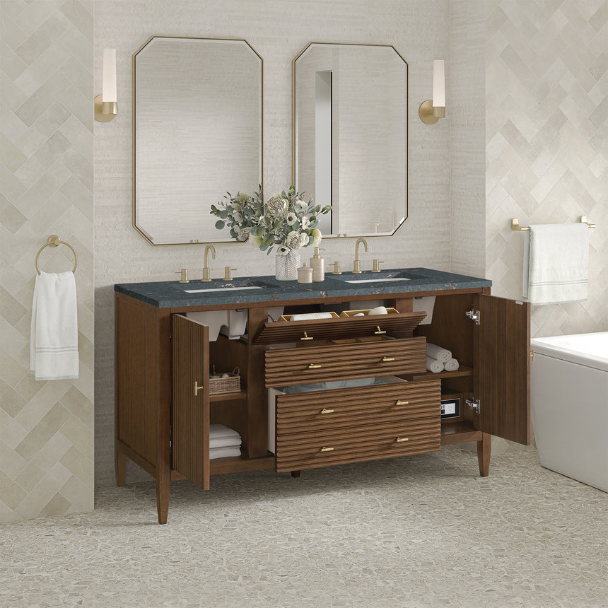 White bathroom vanity with marble countertop and decorative flowers in a bathroom setting.