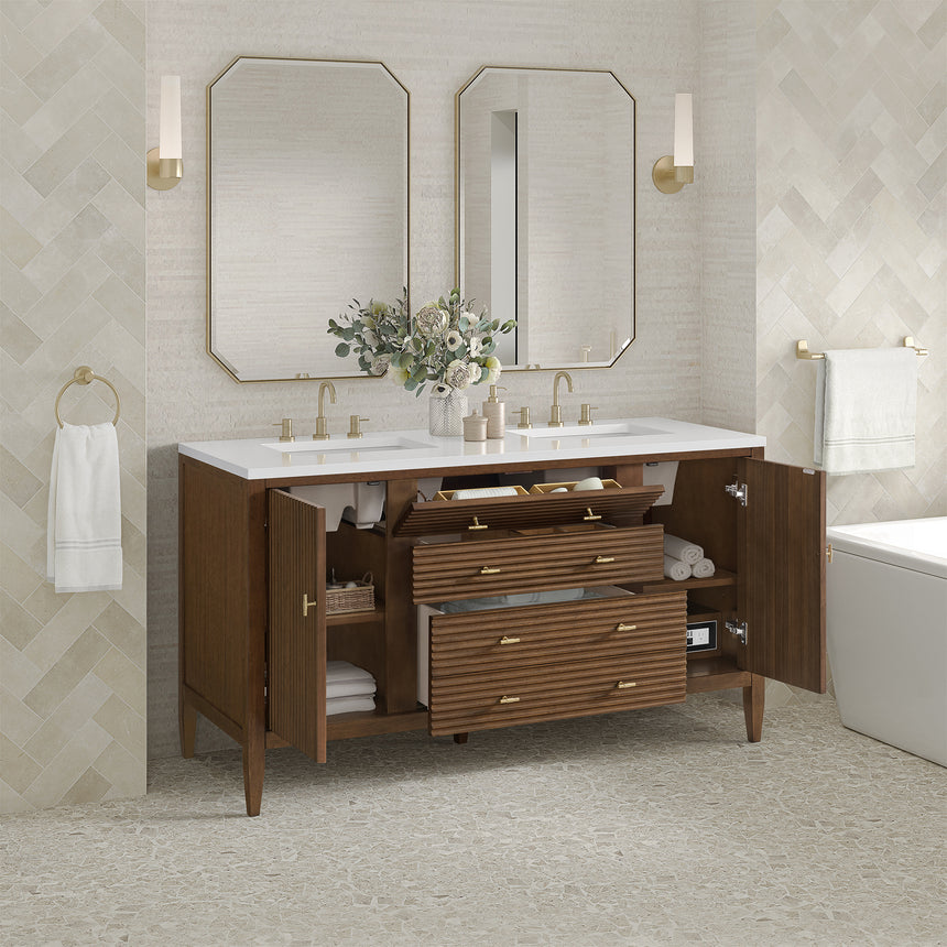 White bathroom vanity with marble countertop and decorative flowers in a bathroom setting.