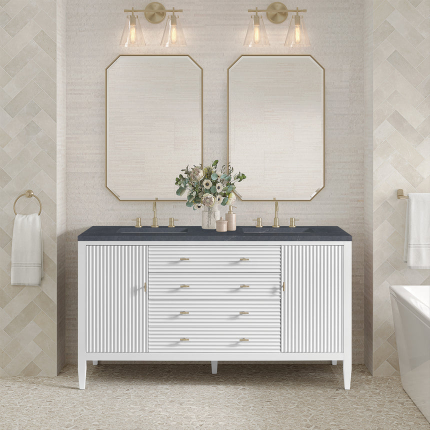 White bathroom vanity with marble countertop and decorative flowers in a bathroom setting.