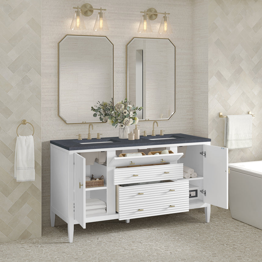 White bathroom vanity with marble countertop and decorative flowers in a bathroom setting.
