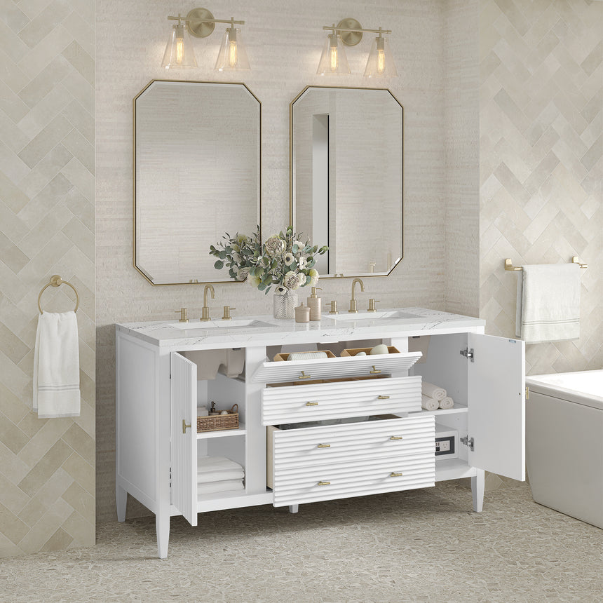 White bathroom vanity with marble countertop and decorative flowers in a bathroom setting.