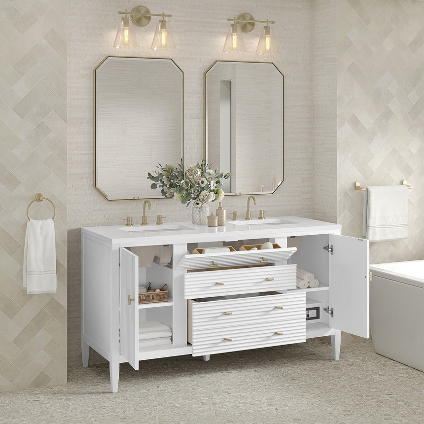 White bathroom vanity with marble countertop and decorative flowers in a bathroom setting.