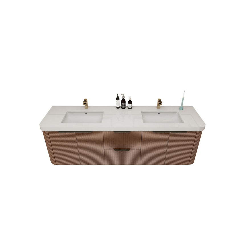 Modern bathroom with wooden vanity, freestanding bathtub, and shower area.