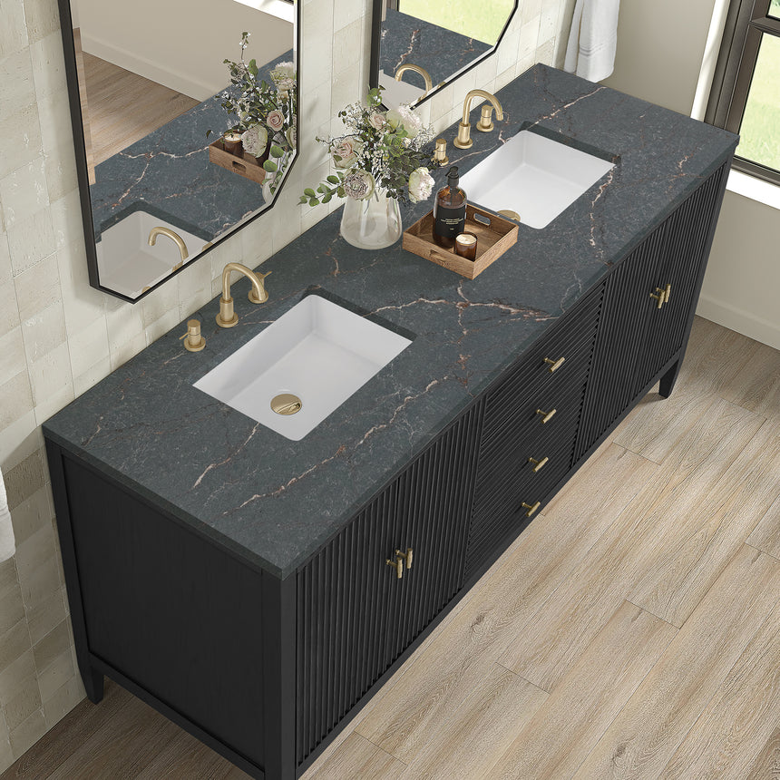 White bathroom vanity with marble countertop and decorative flowers in a bathroom setting.