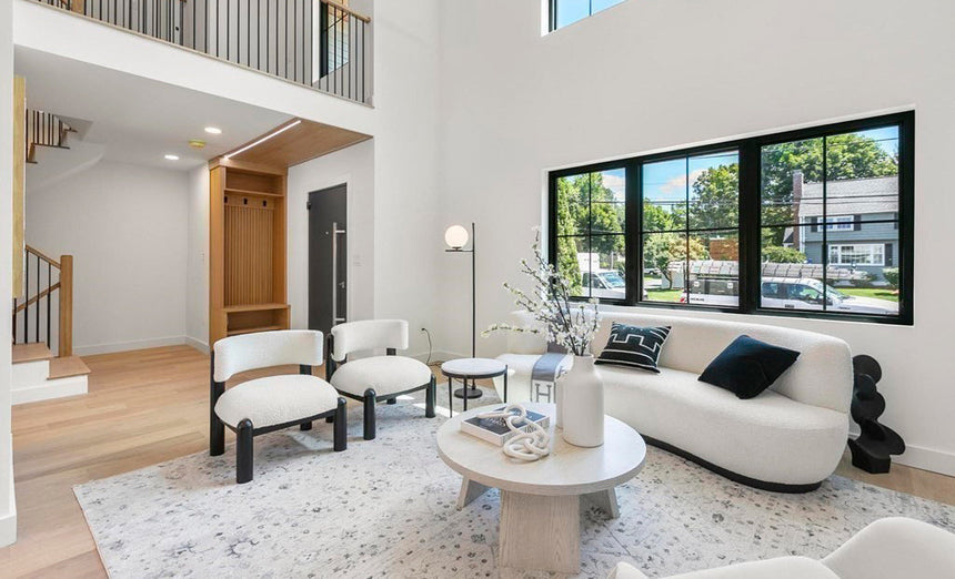 Modern luxury home exterior with palm trees and minimalist landscaping in Henderson, NV.