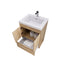Bathroom vanity with sink and open drawer on a white background