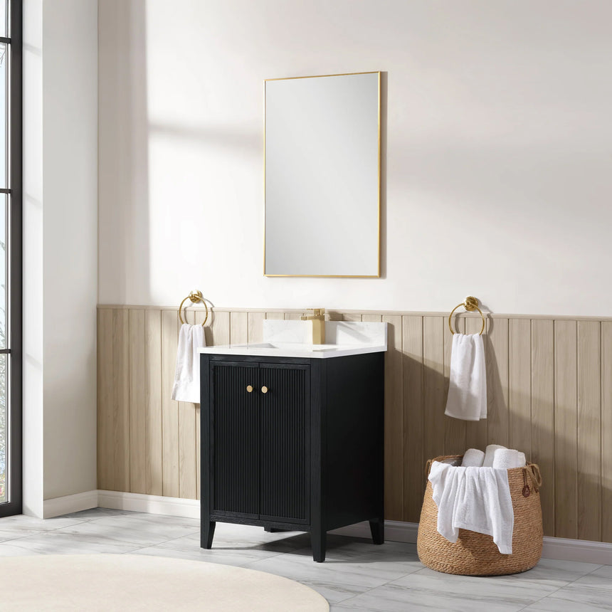 Bathroom vanity with double sink, mirrors, and towels in a well-lit room.