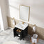 Bathroom vanity with sink, mirror, and towel rack in a modern bathroom setting.