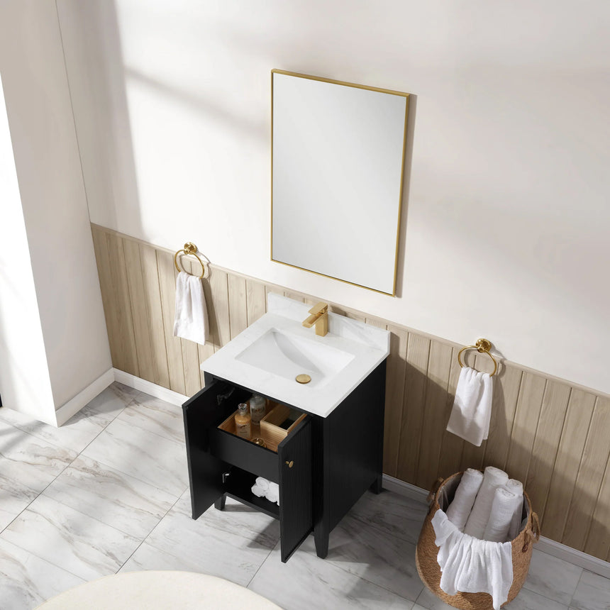 Bathroom vanity with double sink, mirrors, and towels in a well-lit room.