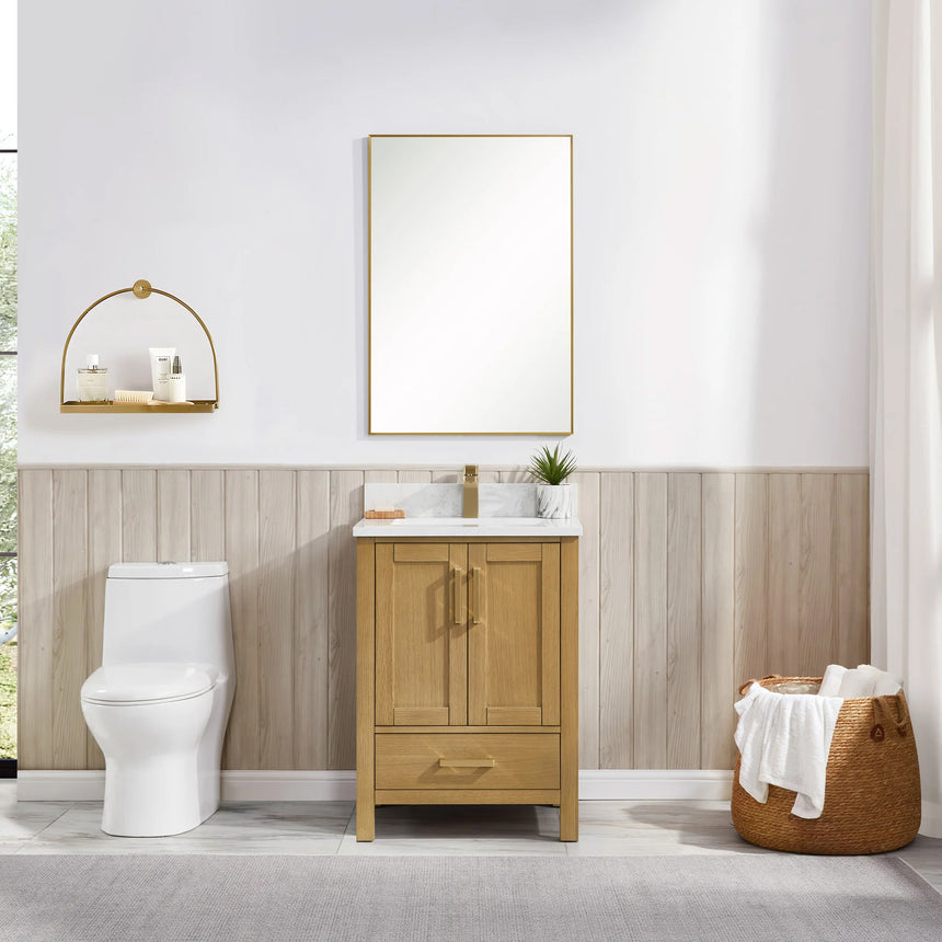 Bathroom vanity with wooden cabinets and white countertop, featuring a toilet and towel on the side.