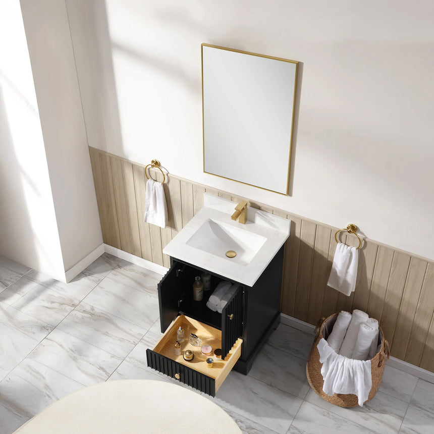 Bathroom vanity with wooden cabinet and white countertop in a bathroom setting.