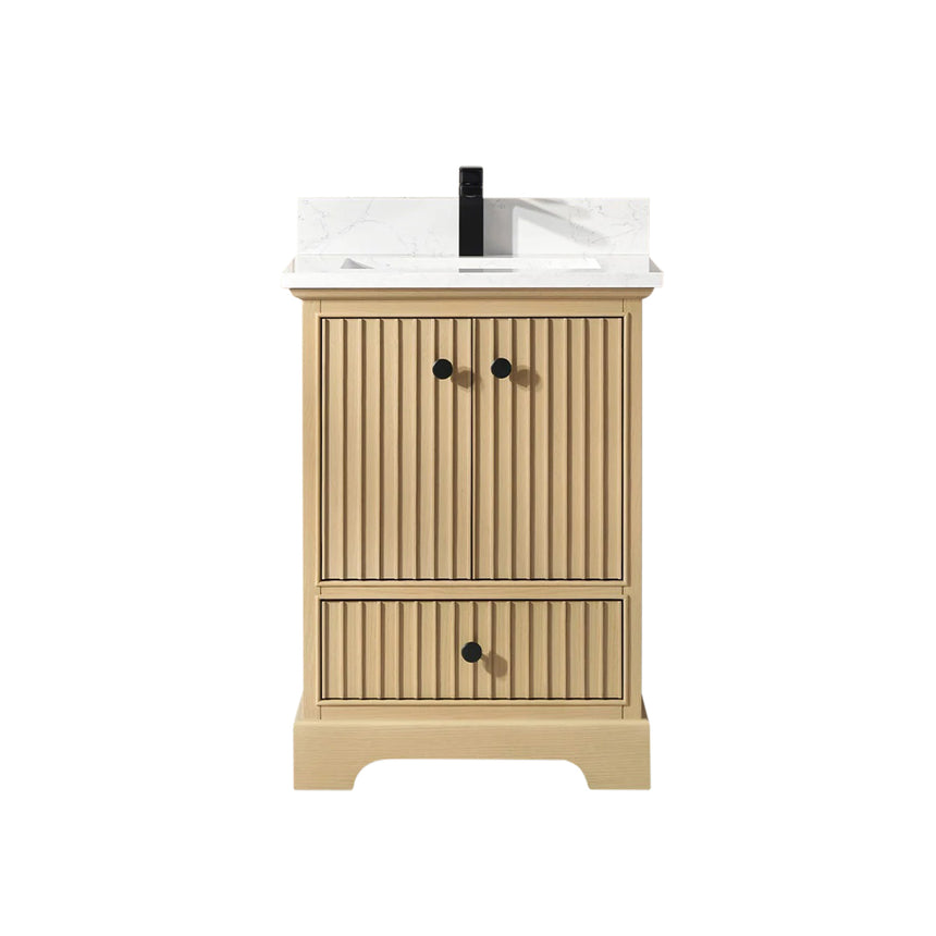 Bathroom vanity with wooden cabinet and white countertop in a bathroom setting.