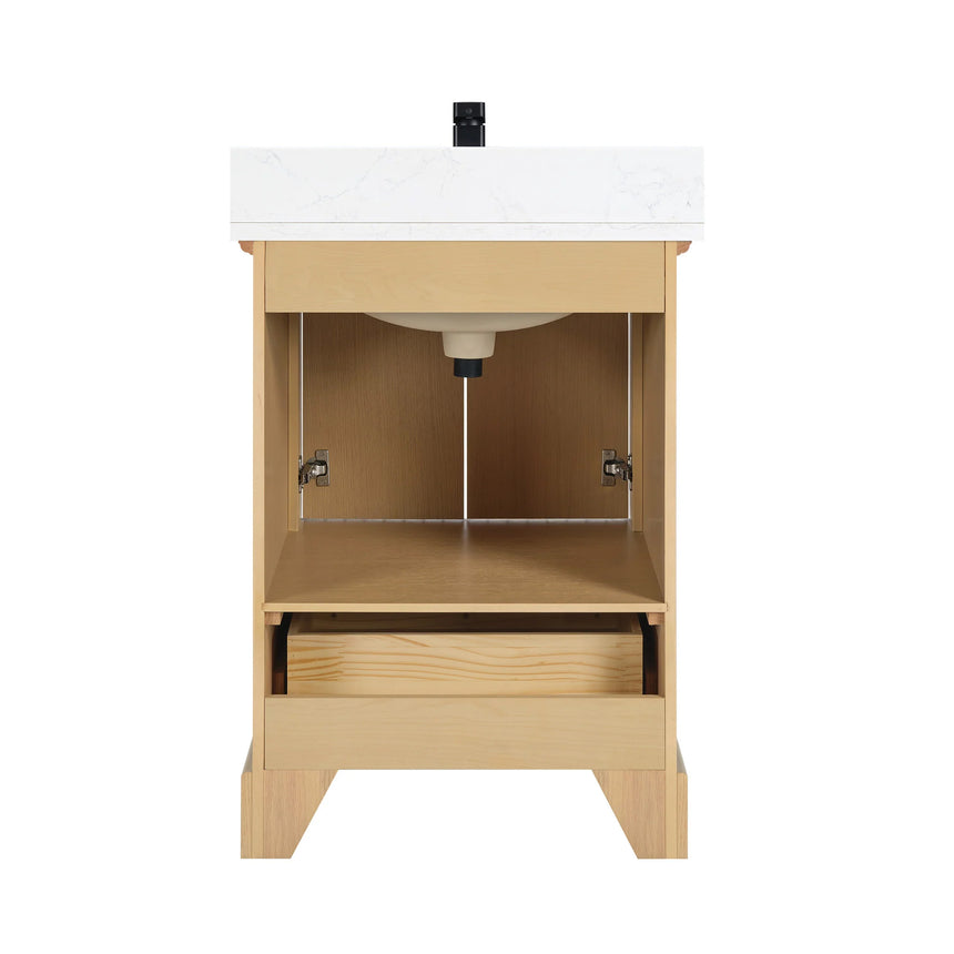 Bathroom vanity with wooden cabinet and white countertop in a bathroom setting.