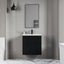 Modern bathroom with black vanity unit, mirror, and towel rack.