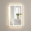 Bathroom mirror with LED lighting on a neutral wall