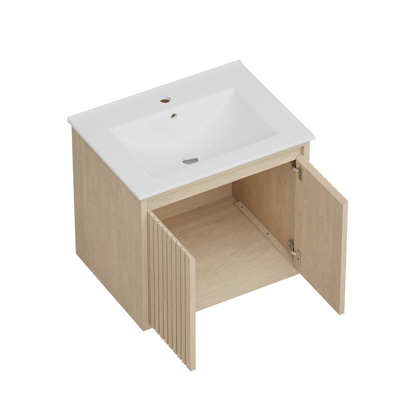 Bathroom vanity with mirror and lighting fixtures on a tiled wall.