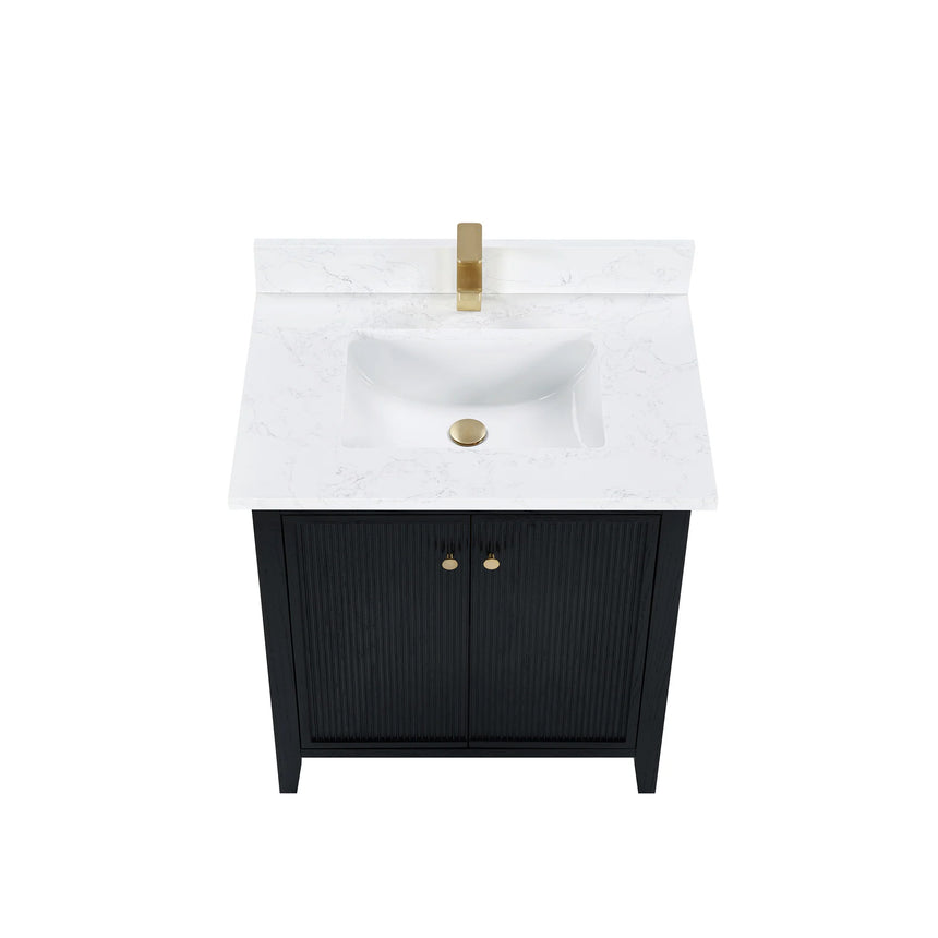 Bathroom vanity with double sink, mirrors, and towels in a well-lit room.