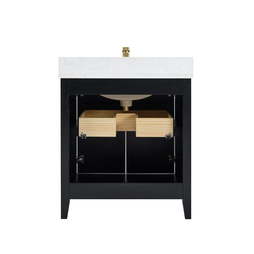 Bathroom vanity with double sink, mirrors, and towels in a well-lit room.