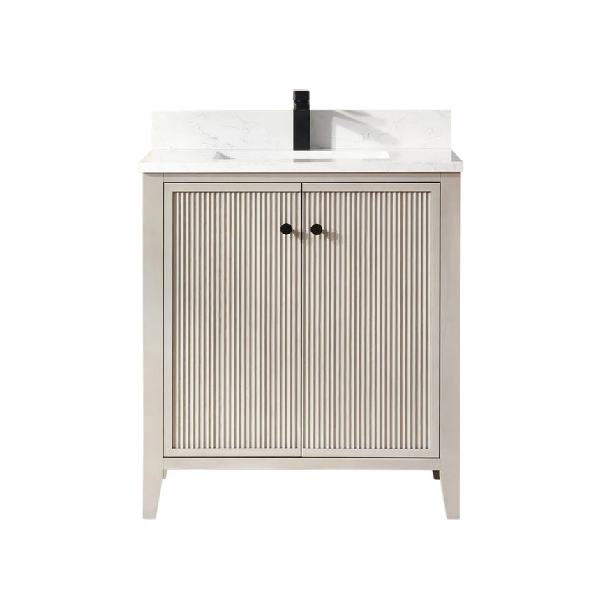 Bathroom vanity with double sink, mirrors, and towels in a well-lit room.