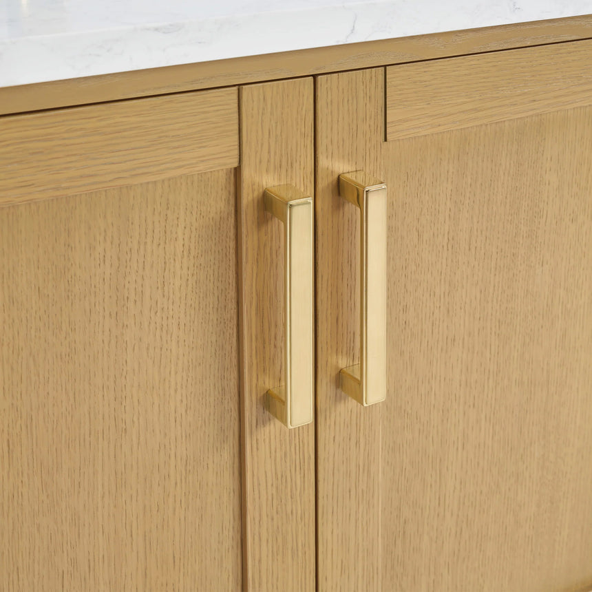 Bathroom vanity with wooden cabinets and white countertop, featuring a toilet and towel on the side.