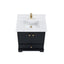 Black bathroom vanity with white countertop and gold fixtures on a white background