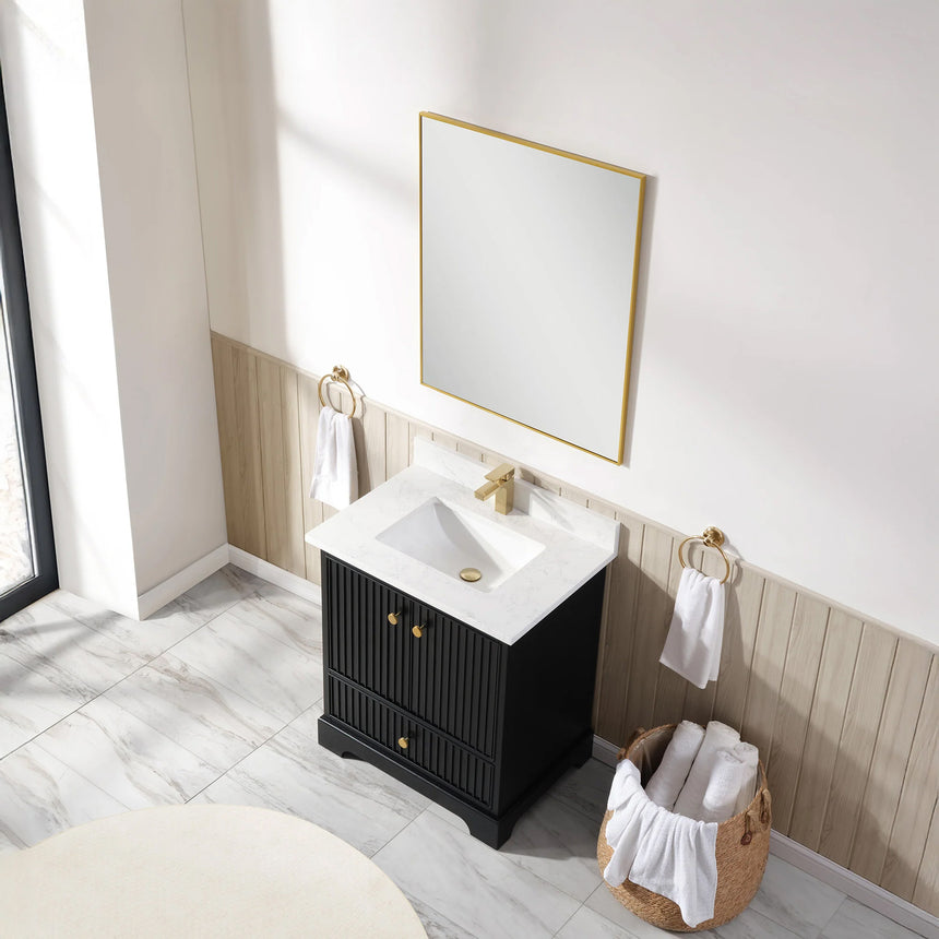 Bathroom vanity with wooden cabinet and white countertop in a bathroom setting.