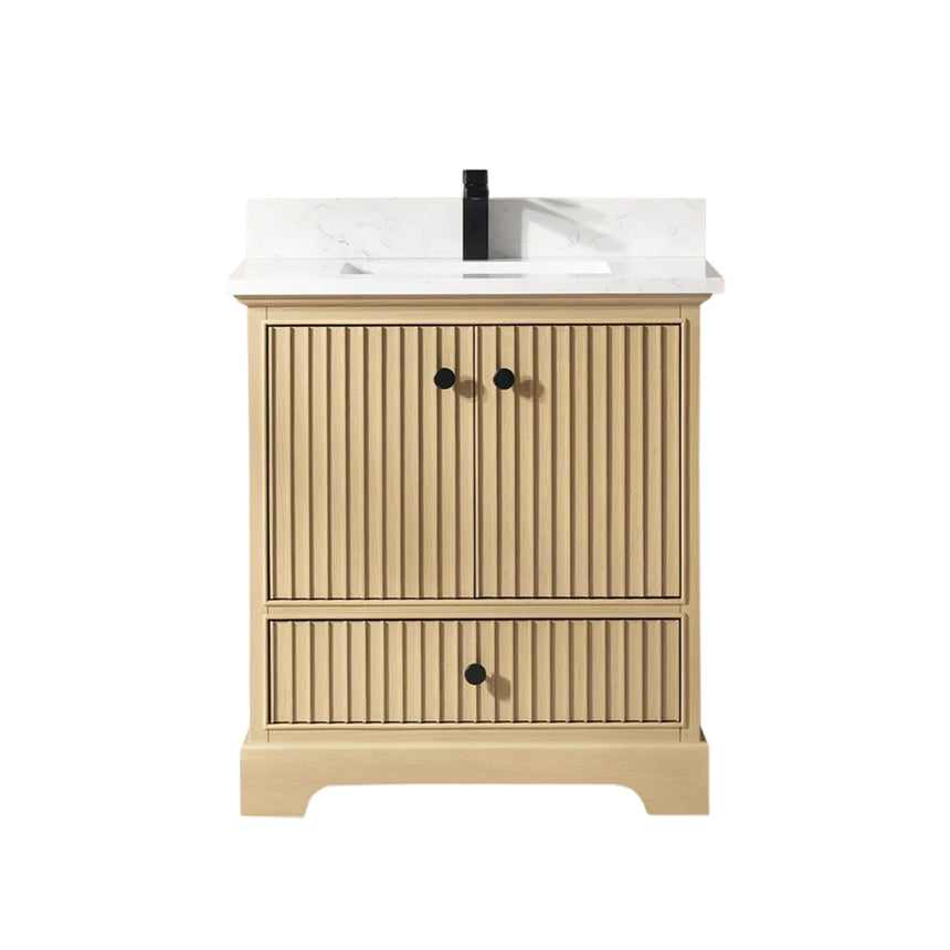 Bathroom vanity with wooden cabinet and white countertop in a bathroom setting.