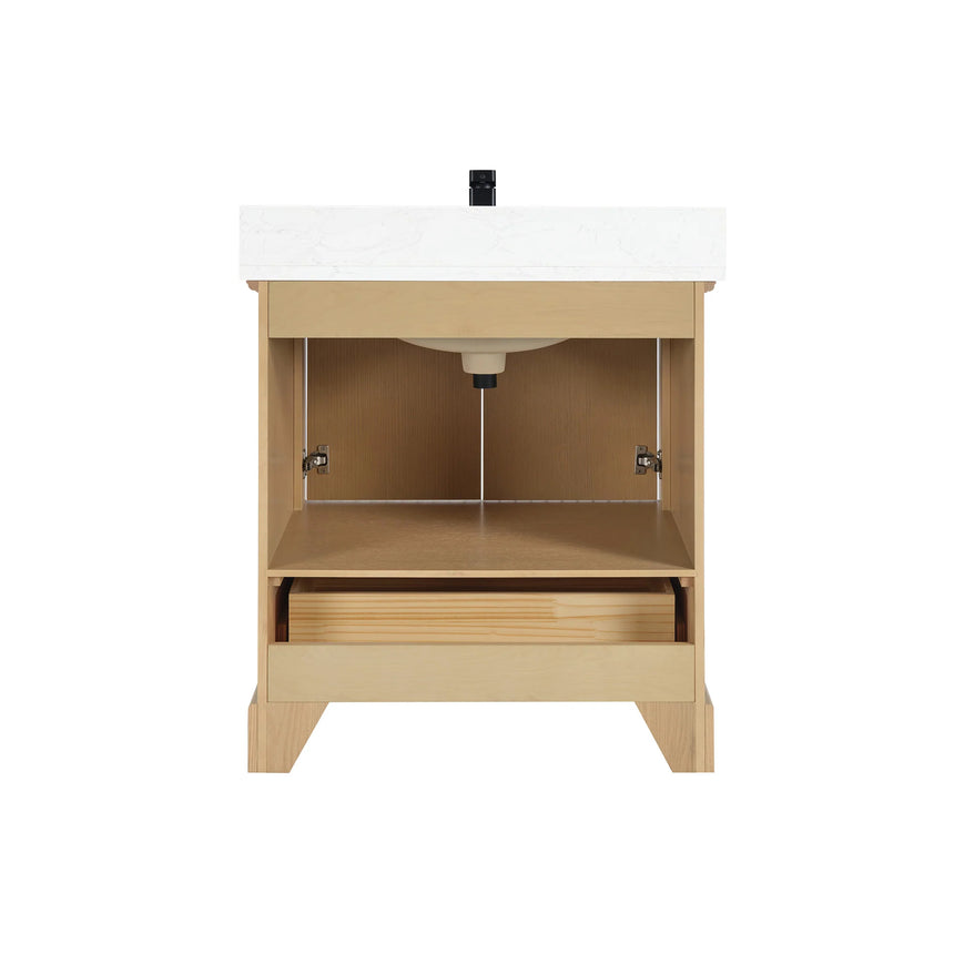 Bathroom vanity with wooden cabinet and white countertop in a bathroom setting.