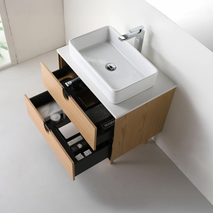 Bathroom vanity with two sinks, mirrors, and decorative elements.