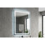 Bathroom mirror with LED lighting on a concrete wall.