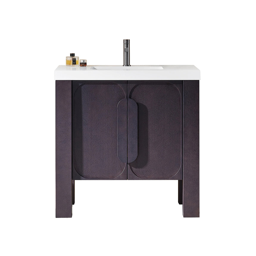 Bathroom with wooden vanity, white countertop, and decorative elements.