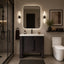 Modern bathroom with dark vanity, mirror, and toilet.