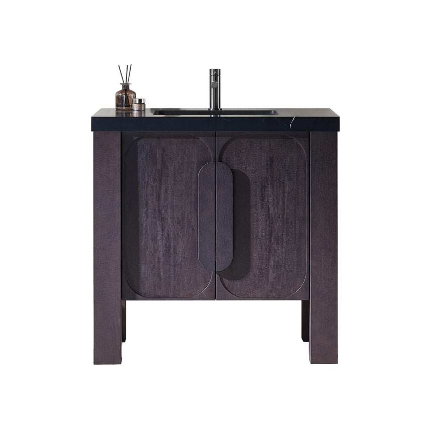Bathroom with wooden vanity, white countertop, and decorative elements.