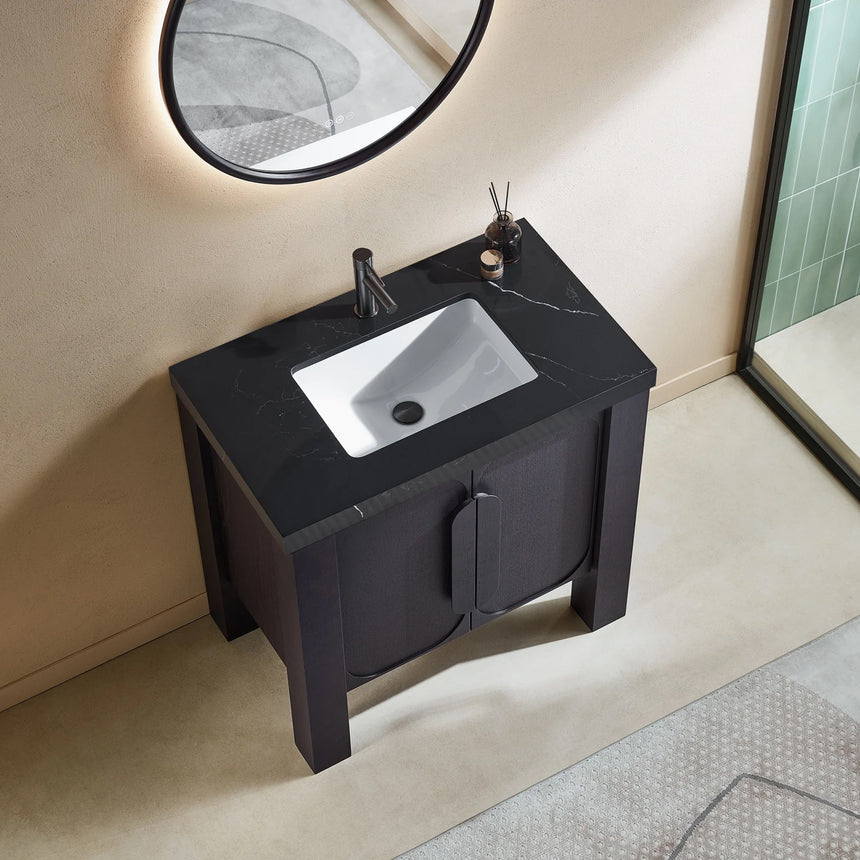 Bathroom with wooden vanity, white countertop, and decorative elements.