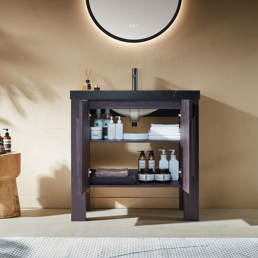Bathroom with wooden vanity, white countertop, and decorative elements.