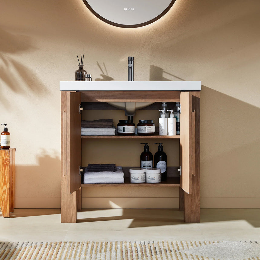 Bathroom with wooden vanity, white countertop, and decorative elements.