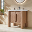 Wooden bathroom vanity with white countertop in a bright room