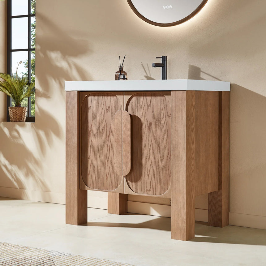 Bathroom with wooden vanity, white countertop, and decorative elements.